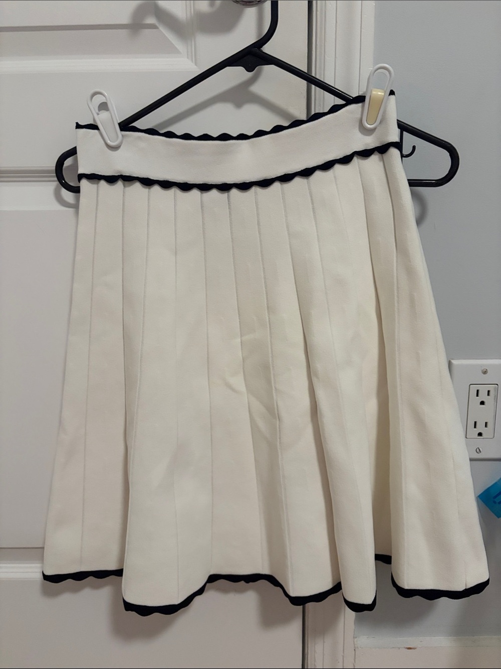Elegant White Pleated Skirt with Black Trim